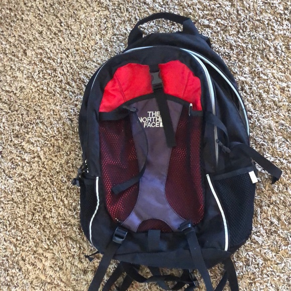 The North Face black and red backpack